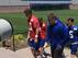 Eli Manning walks alongside of new offensive coordinator Ben McAdoo.