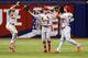 Jon Jay (left), Peter Bourjos (middle) and Randal Grichuk (right) celebrate after defeating Tampa Bay 1-0 on June 10.