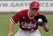 Stanford third baseman Danny Diekroeger catches a ball against Vanderbilt on June 9.