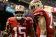 49ers quarterback Colin Kaepernick (No. 7) and his No. 1 weapon Michael Crabtree (No. 15) will return to lethal efficacy in 2014.