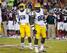 LSU defensive end Jermauria Rasco (No. 59) and Anthony Johnson (No. 90)