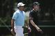 Jimmy Walker (right) walks with Jason Day on Sunday.