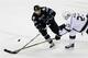 Former-San Jose Sharks Defenseman Dan Boyle and Los Angeles Kings Defenseman Dustin Brown.