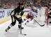 Pittsburgh Penguins defenseman Matt Niskanen and New York Rangers forward Mats Zuccarello.