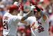 Matt Adams (right) celebrates with Allen Craig (left) after hitting a home run against the Nationals June 15