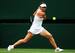 Simona Halep stares down the ball as she readies her backhand.