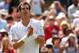Andy Murray applauds after winning his second-round match at Wimbledon.