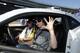 Current Angels and former Rangers pitcher C.J. Wilson shows the claw at a NASCAR event.