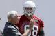 Left tackle Jared Veldheer with an offensive coach during OTAs.