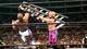 Chris Jericho pummels Shelton Bejamin with a ladder at WrestleMania 21.