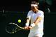 Rafael Nadal hits a backhand during his first round match.