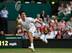 Novak Djokovic sprints to make a play during his second-round match at Wimbledon.