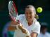 Petra Kvitova hits a backhand during a three-set match against Venus Williams.