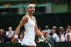 Lucie Safarova flashes her signature smile during her fourth-round match at Wimbledon.