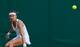 Lucie Safarova keeps her eye on the ball during an early round match at Wimbledon.