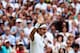 Roger Federer waves to the crowd after winning his quarterfinal match.