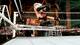 Rob Van Dam hits Rolling Thunder onto Seth Rollins.