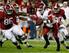 Alex Collins looks for room against Alabama.