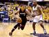 Miami Heat forward Michael Beasley drives against Indiana Pacers forward David West.