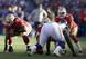 Looney at guard against the St. Louis Rams.