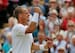Lleyton Hewitt celebrates winning a match at Wimbledon.
