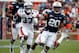 DB Kamryn Melton and RB Corey Grant