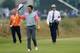 Rory McIlroy salutes the crowd surrounding the 18th hole at Royal Liverpool.