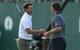 Adam Scott, Justin Rose exchange handshakes after the final round Sunday