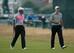 Tiger Woods gives Jordan Spieth some advice during the Open Championship.
