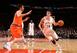Jason Smith drives on Andrea Bargnani. Now they're co-workers.