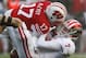 Last year's starting safety Tanner McEvoy has a dogfight ahead of him for the starting quarterback spot.