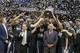 MIchigan State players celebrate winning the 2014 Big Ten Tournament in Indianapolis on March 16