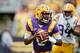LSU quarterback Brandon Harris being chased by defensive end Danielle Hunter