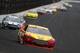 Joey Logano leads the 2014 Brickyard 400 field into Turn 1.