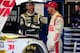 Dale Earnhardt Jr. (right) with teammate Jimmie Johnson