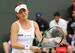Agnieszka Radwanska shows frustration during a loss at 2014 Wimbledon.