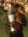 Tiger Woods grips trophy at 2000 PGA Championship.