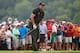 Phil Mickelson anxiously watches a putt Sunday.