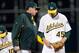 Melvin removes Johnson from the game on April 2 after a blown save against the Indians.