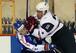 Iverson imposes his will on a Finnish player.