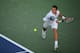 Milos Raonic reaches to make a play on the ball during his opening match in Cincinnati.