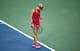 A dejected Eugenie Bouchard during a match against Svetlana Kuznetsova at the 2014 Western & Southern Open in Cincinnati.