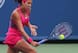 Madison Keys hits a backhand during a match at the Western and Southern Open in Cincinnati.