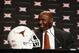 Hired to instill a new attitude within the program, Charlie Strong will coach the Longhorns to a major upset in 2014.