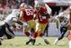 Ryan Carrethers prepares to take down 49ers quarterback Josh Johnson.