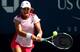 Monica Niculescu hits a forehand during a match at the 2014 U.S. Open.