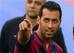 Sergio Busquets is going about his business with the usual aplomb.
