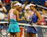 Caroline Wozniacki shakes hands with Peng Shuai after winning a match in New Haven in 2013.