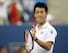 Kei Nishikori celebrates his quarterfinals win over Stan Wawrinka at the 2014 U.S. Open.