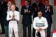 Nico Rosberg (left) was handed victory from Lewis Hamilton in Monaco.
